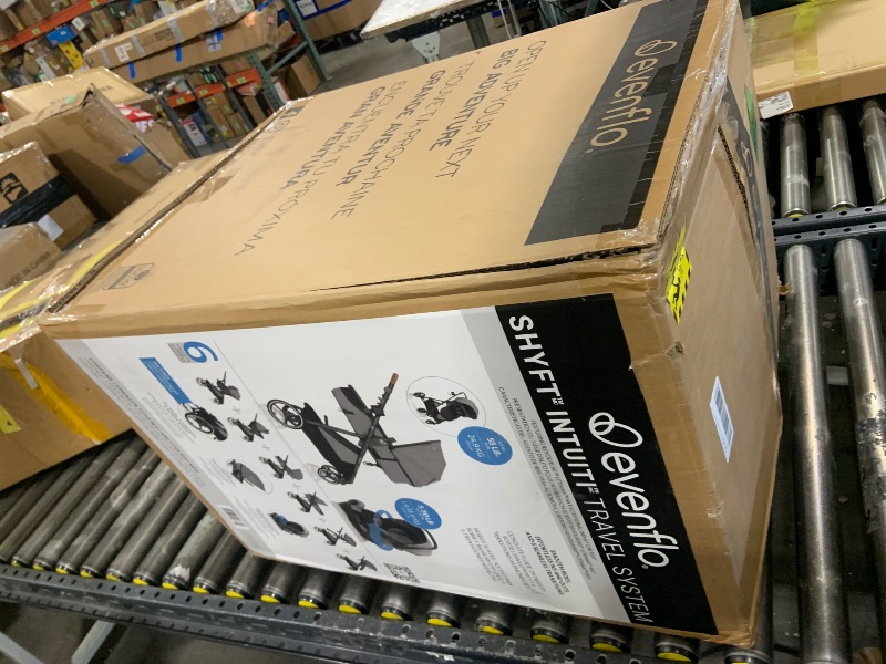 Photo 1 of Evenflo Shyft Intuiti Travel System with Revolve180 LiteMax™ NXT Rotating Rear-Facing Lightweight Preemie and Infant Car Seat 3-30 lbs. (Fossil Gray)