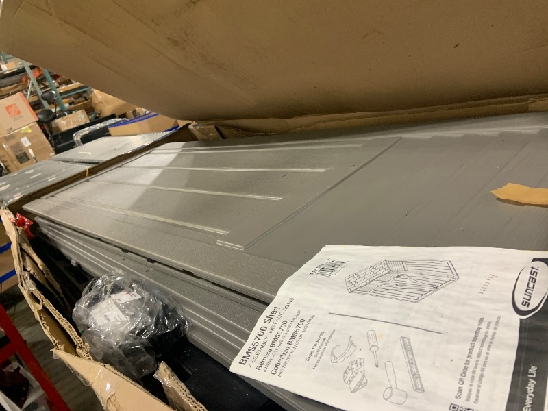 Photo 1 of Suncast Outdoor Storage Cabinet Waterproof Resin Vertical Outdoor Storage Shed (54 cu. ft.) for Patio, Garden Tools, Cushions, & Equipment. Weatherproof Plastic Multi-Wall Design, Capacity Made in USA