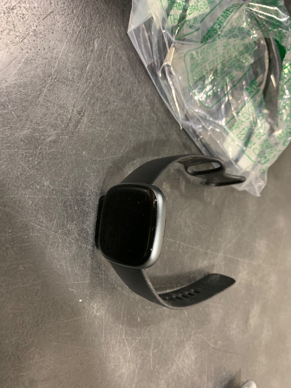 Photo 1 of Fitbit Versa 4 Fitness Smartwatch with Daily Readiness, GPS, 24/7 Heart Rate, 40+ Exercise Modes, Sleep Tracking and more, Black/Graphite, One Size (S & L Bands Included)