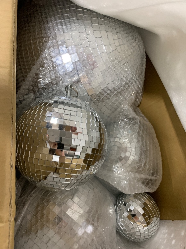 Photo 1 of Haull 8 Pcs Large Disco Ball Set Silver Mirror Disco Reflective Ball with Hanging Ring Party Ornament Decoration for Stage Club Ballroom Dance Hall Wedding Prom Props(12'', 8'', 6'', 4'')