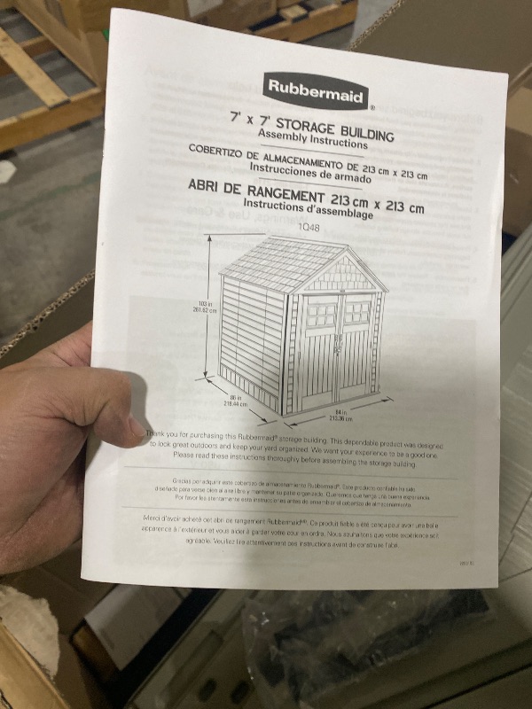 Photo 1 of Rubbermaid 7 Foot by 7 Foot Weatherproof Outdoor Storage Shed for Garden Tools and Lawn Machinery Organization with Lockable Double Door Sandstone