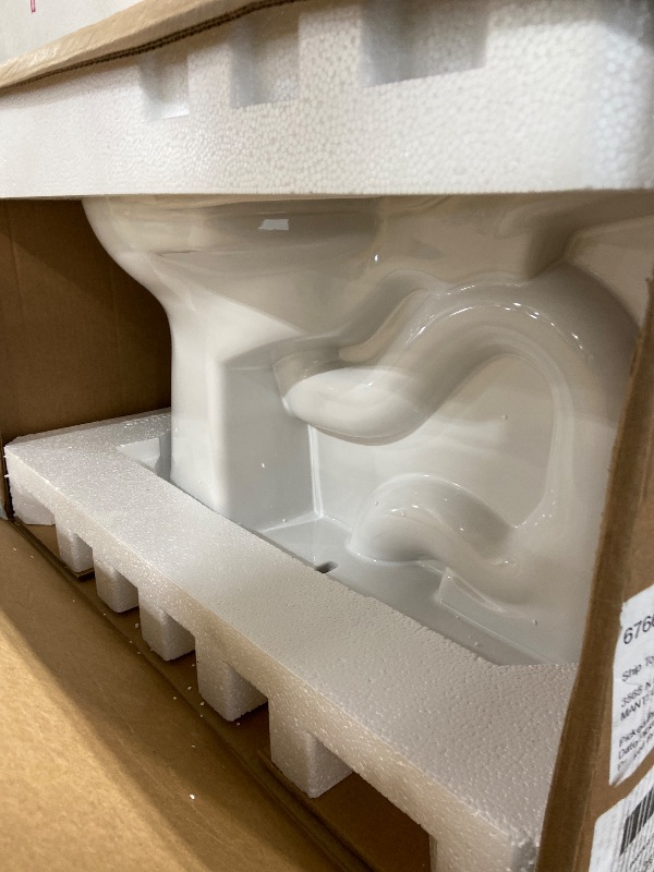 Photo 1 of TOTO Drake Transitional Two-Piece Elongated 1.28 GPF Universal Height TORNADO FLUSH Toilet with CEFIONTECT, Cotton White - CST786CEFG#01