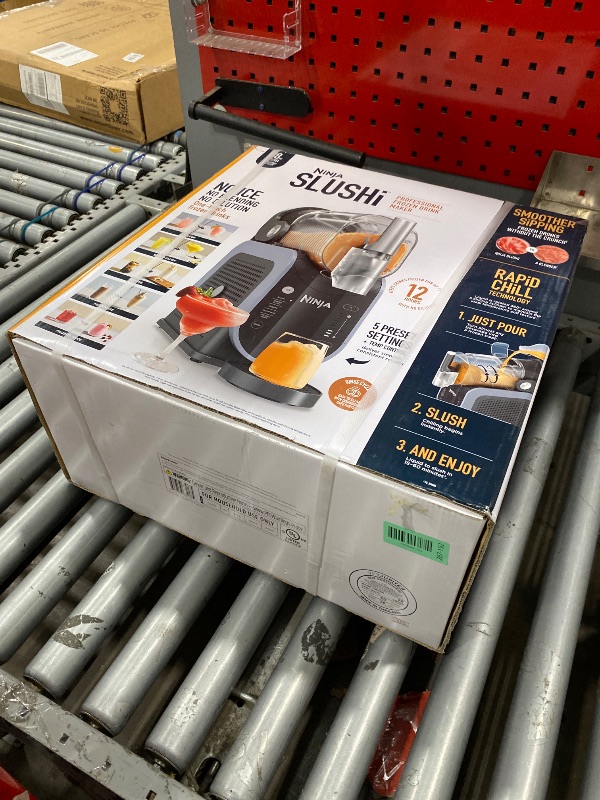 Photo 1 of **Factory Sealed** Ninja SLUSHi Frozen Drink & Slushie Machine with RapidChill Technology | 88 oz. Easy Fill Vessel | 5 Preset Programs | Make Margaritas, Frappés, & More | With Dishwasher Safe Parts | Black | FS301