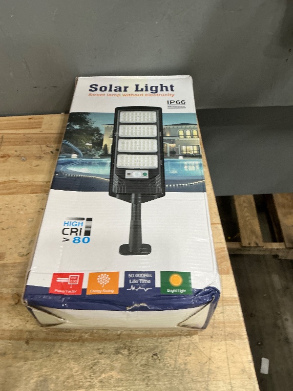 Photo 1 of ****ONE IS NON FUNCTIONAL *** Solar Street Lights Outdoor Waterproof, LED Dusk to Dawn Solar Light, Flood Lights with Motion Sensor and Remote Control, for Exterior Wall, Patio, Yard, Deck, Garden,Parking Lot Lights(2-Pack)