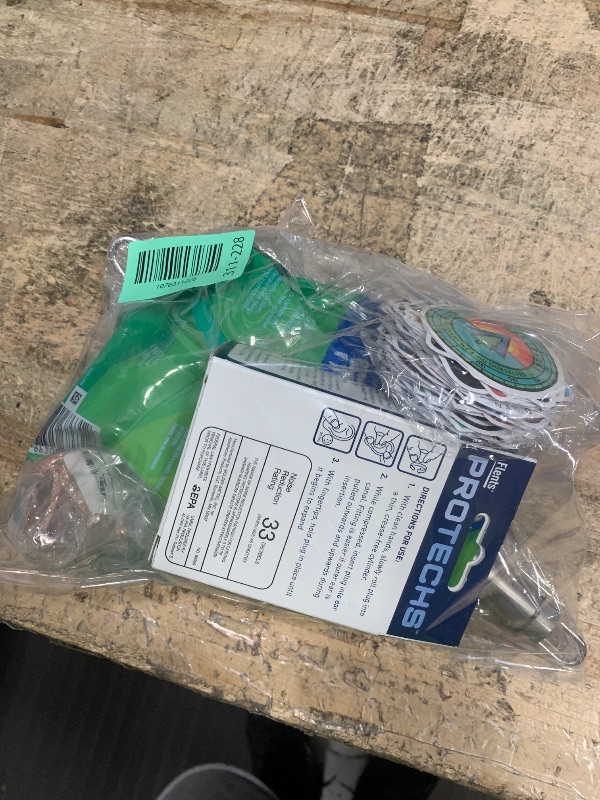 Photo 1 of  Oral b floss picks, mesh strainer, foam ear plugs, ETC