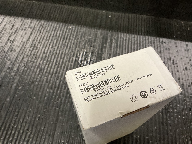 Photo 1 of Apple Watch Ultra 2 (GPS + Cellular, 49MM) - Black Titanium Case with Black Ocean Band (Renewed)