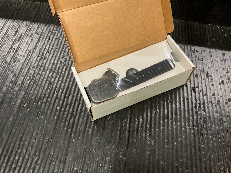 Photo 1 of Apple Watch Ultra 2 (GPS + Cellular, 49MM) - Black Titanium Case with Black Ocean Band (Renewed)