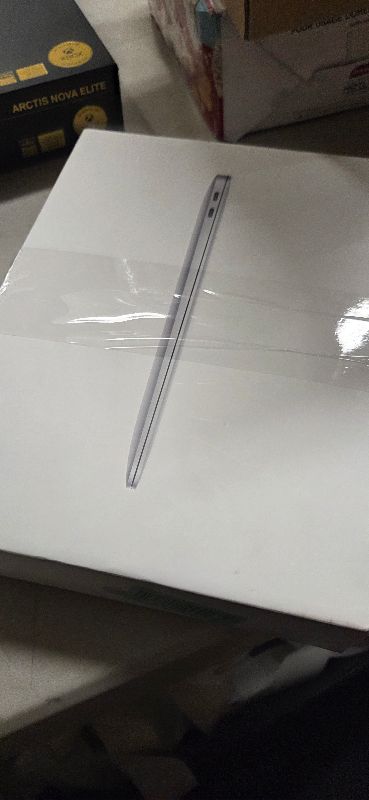 Photo 1 of 2020 Apple MacBook Air Laptop: Apple M1 Chip, 13” Retina Display, 8GB RAM, 256GB SSD Storage, Backlit Keyboard, FaceTime HD Camera, Touch ID. Works with iPhone/iPad; Silver