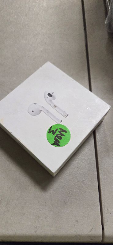 Photo 1 of Apple AirPods with Wireless Charging Case