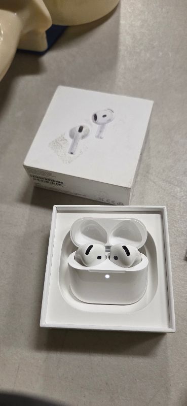 Photo 1 of Apple AirPods 4 Wireless Earbuds, Bluetooth Headphones, with Active Noise Cancellation, Adaptive, Transparency Mode, Personalized Spatial Audio, USB-C Charging Case, Wireless Charging, H2 Chip