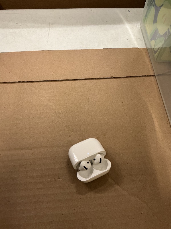 Photo 1 of Apple AirPods 4 Wireless Earbuds, Bluetooth Headphones, with Active Noise Cancellation, Adaptive, Transparency Mode, Personalized Spatial Audio, USB-C Charging Case, Wireless Charging, H2 Chip