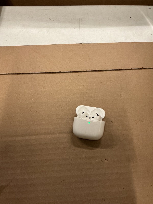 Photo 1 of Apple AirPods 4 Wireless Earbuds, Bluetooth Headphones, with Active Noise Cancellation, Adaptive, Transparency Mode, Personalized Spatial Audio, USB-C Charging Case, Wireless Charging, H2 Chip