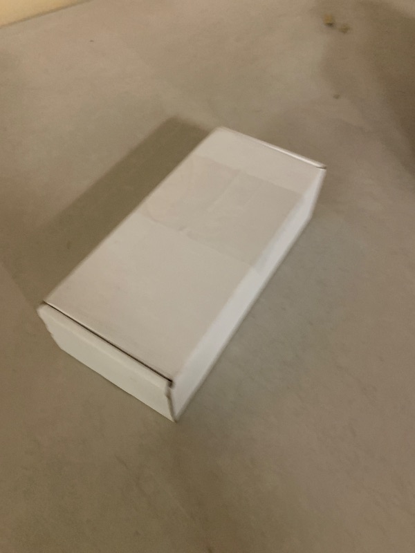 Photo 1 of Apple Watch Ultra 2 (GPS + Cellular, 49MM) - Black Titanium Case with Black Ocean Band (Renewed)