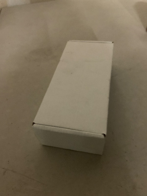 Photo 1 of Apple Watch Ultra 2 (GPS + Cellular, 49MM) - Black Titanium Case with Black Ocean Band (Renewed)