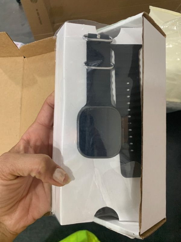 Photo 1 of Apple Watch Ultra 2 (GPS + Cellular, 49MM) - Black Titanium Case with Black Ocean Band (Renewed)