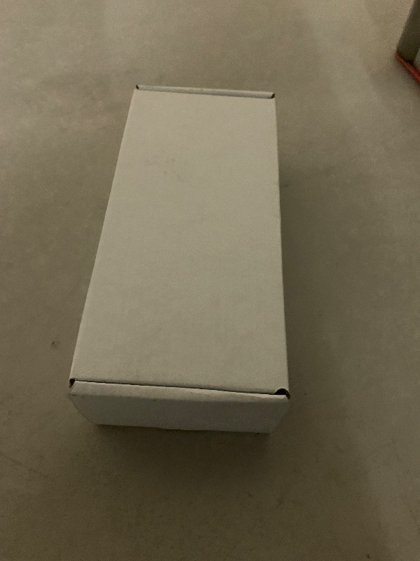 Photo 1 of Apple Watch Ultra 2 (GPS + Cellular, 49MM) - Black Titanium Case with Black Ocean Band (Renewed)