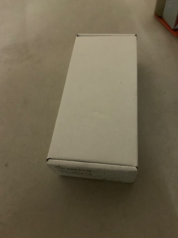 Photo 1 of Apple Watch Ultra 2 (GPS + Cellular, 49MM) - Black Titanium Case with Black Ocean Band (Renewed)