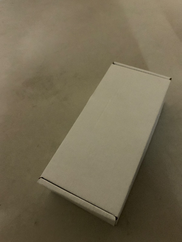 Photo 1 of Apple Watch Ultra 2 (GPS + Cellular, 49MM) - Black Titanium Case with Black Ocean Band (Renewed)