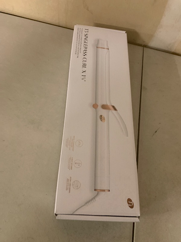 Photo 1 of T3 SinglePass Curl X Extra-Long Barrel Curling Iron with 9 Heat Settings and Ceramic Barrel for Fast Styling and Lasting Results on All Hair Types