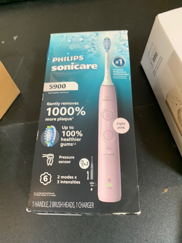 Photo 1 of Philips Sonicare 5900 Series Electric Toothbrush - Next-Generation Sonicare Technology, Pressure Sensor, 6 Brushing Settings, SmarTimer, BrushPacer, 21-Day Runtime, Light Pink, Model HX7132/02
