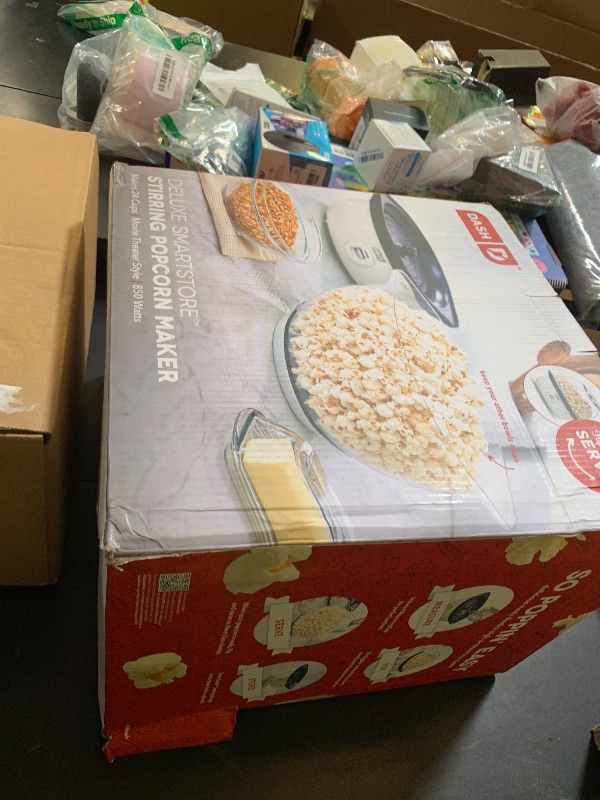 Photo 1 of Dash SmartStore® Stirring Popcorn Maker - Electric Popcorn Machine with Butter-Melting Tray & Clear Serving Bowl - Features Stirring Bar - 24 Cups, White