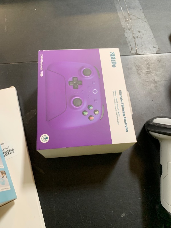 Photo 1 of 8BitDo Ultimate 2 Wireless Controller for Windows PC, Apple, Steam & Android, Gaming Controller with TMR Joysticks, Hall/Tactile Triggers, Motion Control, RGB Fire Ring, 1000Hz Polling Rate, Purple