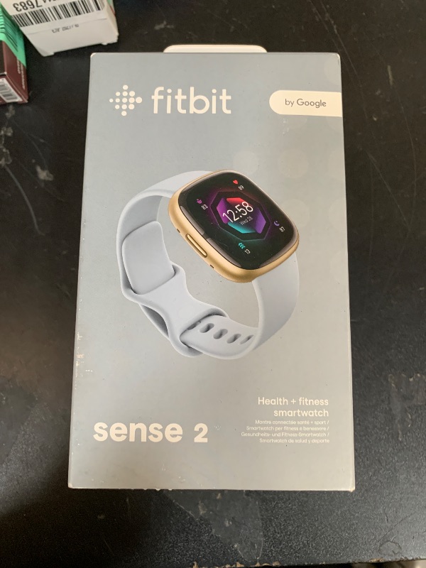 Photo 1 of Fitbit Sense 2 Advanced Health and Fitness Smartwatch with Tools to Manage Stress and Sleep, ECG App, SpO2, 24/7 Heart Rate and GPS, Blue Mist/Pale Gold, One Size (S & L Bands Included)