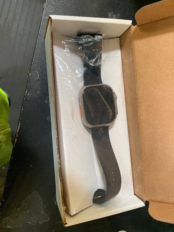 Photo 1 of Apple Watch Ultra [GPS + Cellular 49mm] Titanium Case with Midnight Ocean Band, One Size (Renewed)