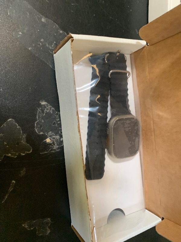 Photo 1 of Apple Watch Ultra [GPS + Cellular 49mm] Titanium Case with Midnight Ocean Band, One Size (Renewed)