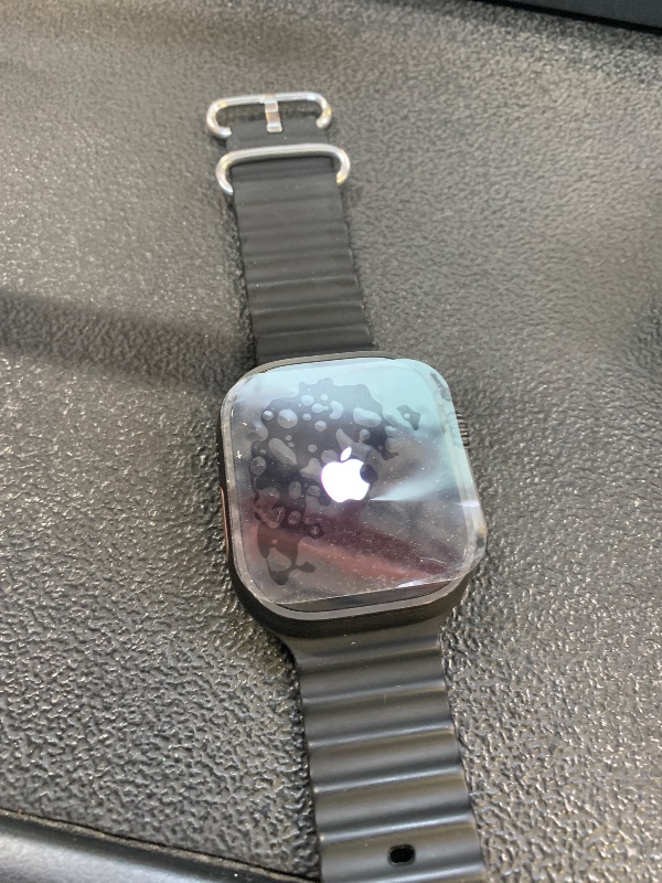 Photo 1 of Apple Watch Ultra 2 (GPS + Cellular, 49MM) - Black Titanium Case with Black Ocean Band (Renewed Premium)