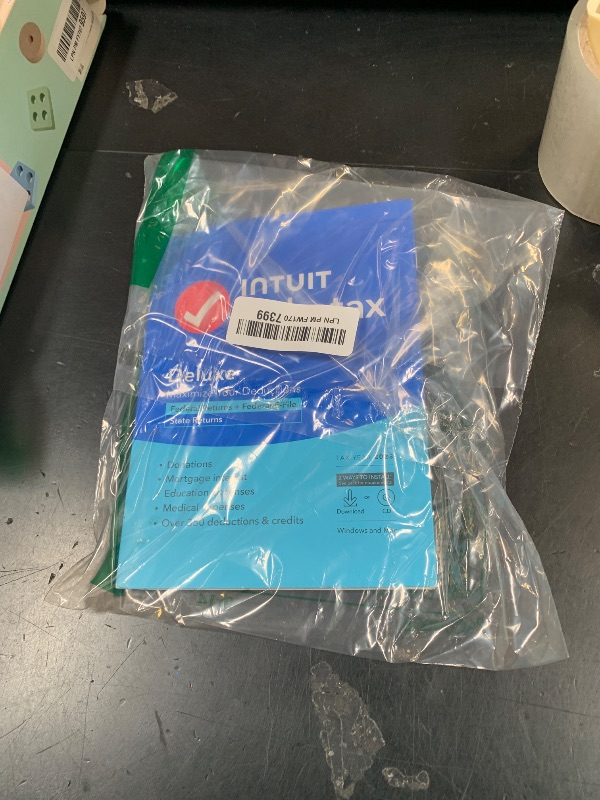 Photo 1 of [Old Version] TurboTax Deluxe 2023, Federal & State Tax Return [PC/Mac Disc]