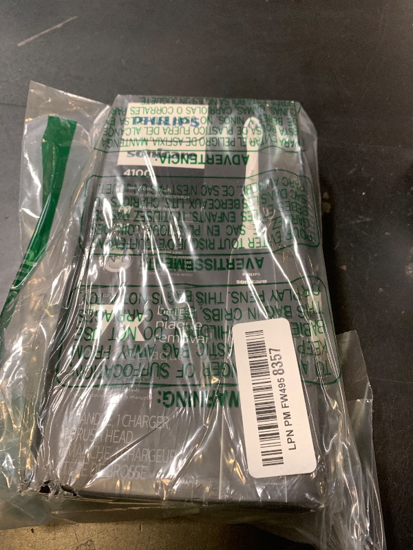 Photo 1 of Philips Sonicare 4100 Series Electric Toothbrush - Sonic Toothbrush with Advanced Sonic Technology, Pressure Sensor, Two Intensity Settings, Smartimer & Quadpacer, Black, Model HX3681/24