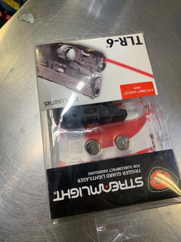 Photo 1 of Streamlight 69273 TLR-6 100-Lumen Tactical Weapon Light with Integrated Red Aiming Laser Designed Exclusively and Solely for M&P Shield and M&P Shield Plus, 9mm/.40 Only, Black