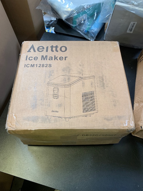 Photo 1 of Aeitto Ice Maker Countertop 26lbs/24H, Ice Machine 8 Ice Cubes Ready in 6 Mins, 2 Sizes of Bullet Ice Portable Ice Makers with Basket & Scoop, Auto Self-Cleaning for Home/Kitchen/Office Stainless