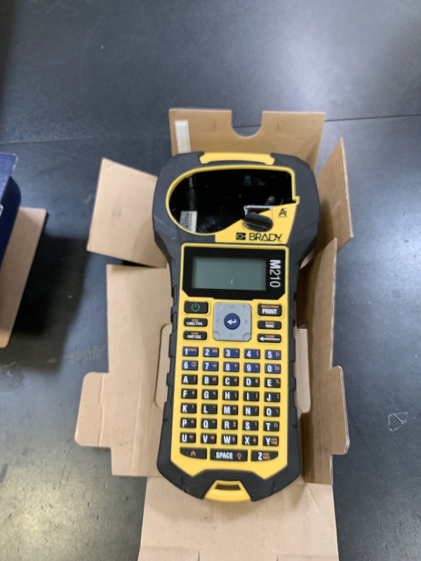 Photo 1 of Brady M210 Portable Label Printer with Rubber Bumpers, Multi-Line Print, 6 to 40 Point Font (Replaces BMP21-PLUS Printer)