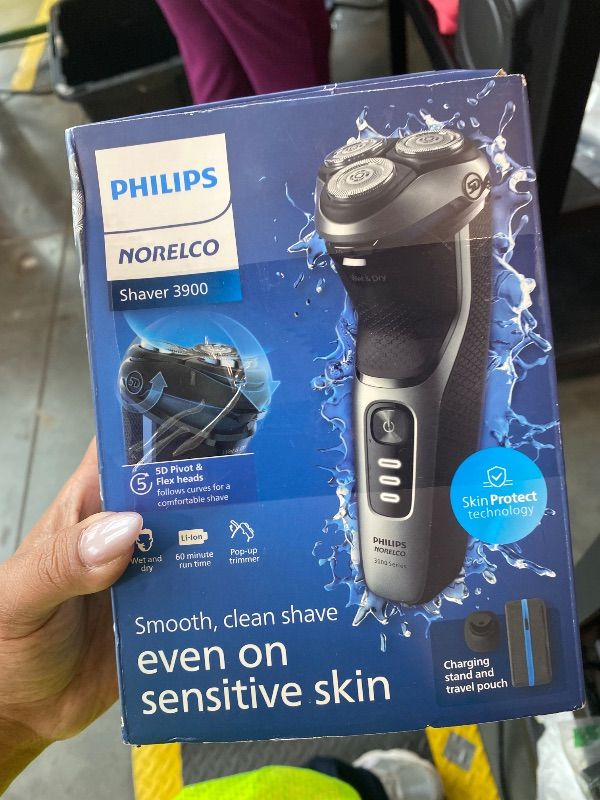 Photo 1 of **USED - MINOR DAMAGE**
Philips Norelco Shaver 3900 Series, Wet and Dry Electric Shaver, P-Cap, Travel Pouch, Charging Stand, Storm Blue, Model S3341/92