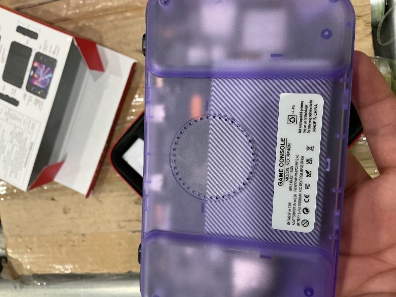 Photo 1 of ***NOT WORKING*** RF40H Handheld Game Console, 4.0" Retro Gaming Console Preloaded 20,000+ Classic Games, Open Source Linux System, Support WiFi Online Play, Portable Pocket Hand Held Video Game (Transparent Purple)