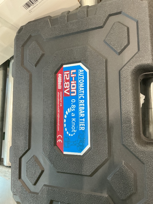Photo 1 of 12.8V automatic rebar tying tool designed for fast steel reinforcement fastening. 
