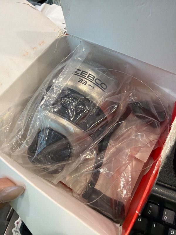 Photo 1 of **UNTESTED**
Zebco 33 MAX Spincast Fishing Reel, Size 60 Reel, Right or Left-Hand Retrieve, 20-Pound Zebco Cajun Line, Graphite Frame, Silver/Black