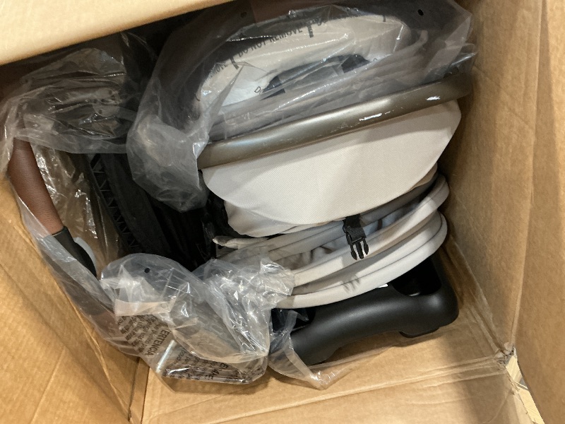 Photo 1 of **NON-FUNCTIONAL**
Maxi-Cosi Zelia Pro 5-in-1 Travel System with Mico Pro Infant Car Seat, Baby Stroller Combo, Reversible Seat, Large Wheels, Adjustable Handle, Newborn to Toddler, Lightweight, Classic Oat