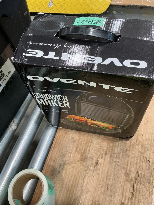 Photo 1 of **USED**
OVENTE Electric Sandwich, Panini and Waffle Maker Set with 3 Removable Non-Stick Plates, 750 Watts, Perfect for Grilled Cheese, Tuna Melts, Burgers, Steaks and Snacks, Black GPI202B