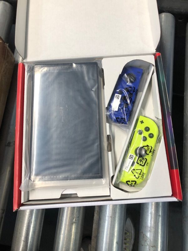 Photo 1 of ***STOCK PHOTO FOR REFERENCE ONLY***
Nintendo Switch – OLED Model w/Neon Green & Blue Joy-Con (Renewed)