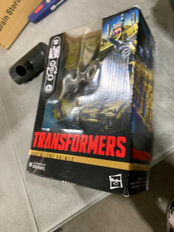 Photo 1 of Transformers Age of The Primes Combaticon Brawl, Voyager Class 5.5-Inch Converting Action Figure, Robot Toys for Ages 8+