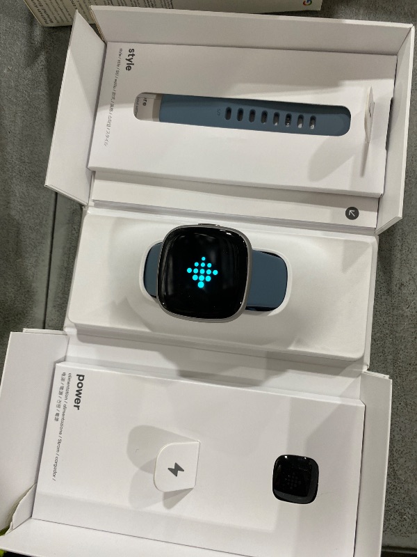 Photo 1 of Fitbit Versa 4 Fitness Smartwatch with Daily Readiness, GPS, 24/7 Heart Rate, 40+ Exercise Modes, Sleep Tracking and more, Waterfall Blue/Platinum, One Size (S & L Bands Included)