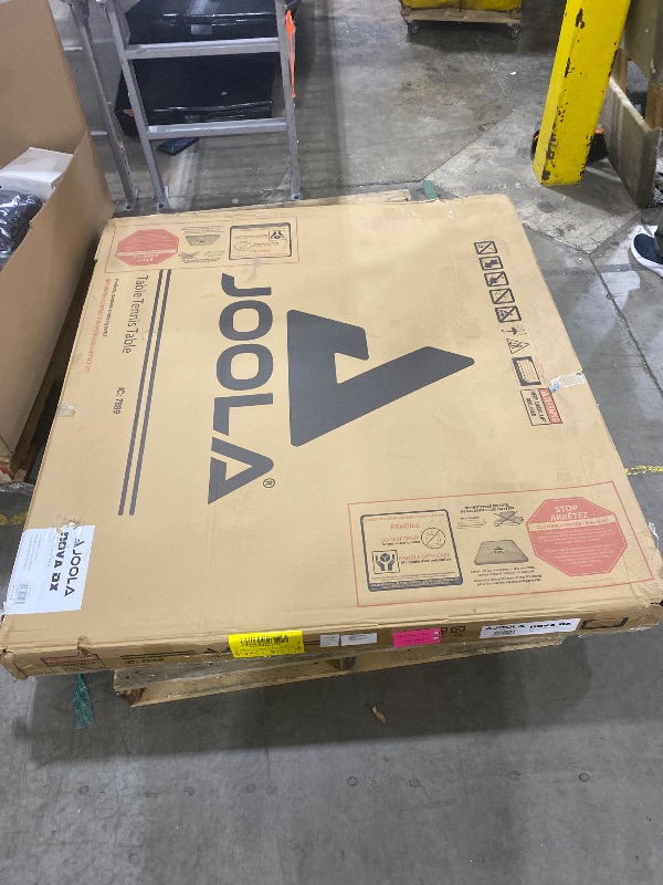 Photo 1 of JOOLA NOVA DX Indoor/Outdoor Table Tennis Table with Weatherproof Net Set