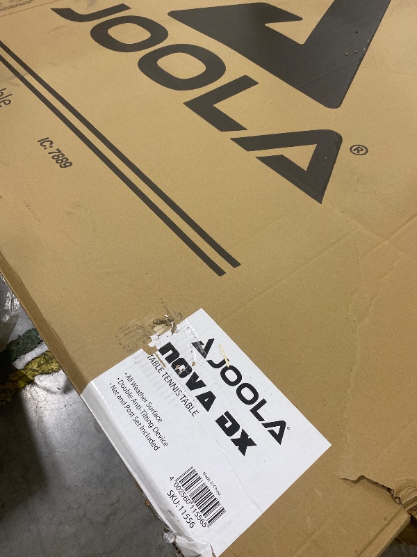 Photo 1 of JOOLA NOVA DX Indoor/Outdoor Table Tennis Table with Weatherproof Net Set