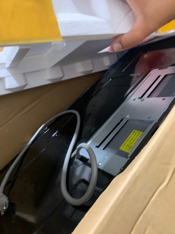 Photo 1 of BLACK+DECKER Over the Range Microwave Oven with Vent and One-Touch Auto Cooking, 1.7 cu. ft. OTR Over Stove Microwave, Black, 1000 Watts, EM044K6CF-BK