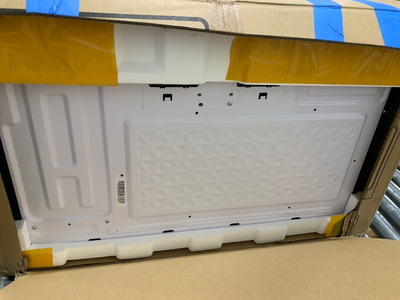 Photo 1 of BLACK+DECKER Over the Range Microwave Oven with Vent and One-Touch Auto Cooking, 1.7 cu. ft. OTR Over Stove Microwave, Black, 1000 Watts, EM044K6CF-BK