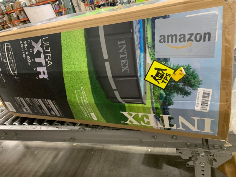 Photo 1 of Intex Ultra XTR Frame 14' x 42" Round Above Ground Outdoor Swimming Pool Set with Sand Filter Pump, Ladder, Ground Cloth, and Pool Cover