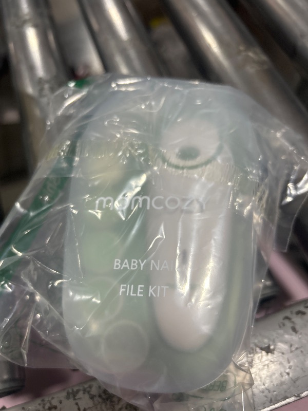 Photo 1 of Momcozy Baby Nail File Electric, Gentle Baby Nail Trimmer Electric, Baby Nail Clipper with Night Light, 7 Grinding Head Replacement Pads, Green